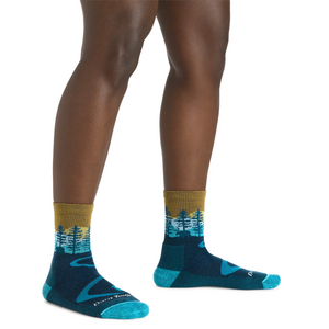 Outdoors Oriented women's Darn Tough Northwoods micro crew hiking socks with a blue forest and mountain landscape design