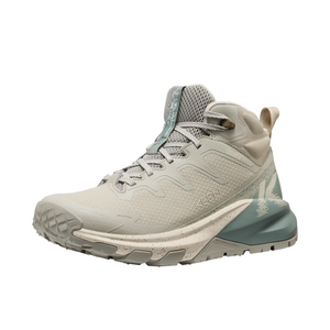 Outdoors Oriented Keen Targhee Apex Mid WP women's hiking boot in beige and sage green with a waterproof mesh upper.